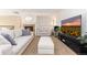 Bright living room with fireplace, comfortable seating, and large-screen TV at 9228 Sori Ln, Highlands Ranch, CO 80126