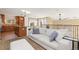 Living room with views to kitchen and upstairs at 9228 Sori Ln, Highlands Ranch, CO 80126