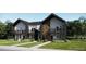 Modern two-story townhome with attached garage and small front yard at 8921 San Antonio St, Littleton, CO 80125