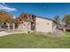 Community clubhouse with picnic tables near tennis court, perfect for social gatherings at 7790 W 87Th Dr # H, Arvada, CO 80005