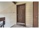 A close up view of the 6-panel exterior door leading into the condo at 7790 W 87Th Dr # H, Arvada, CO 80005