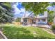 Manicured backyard and green lawn, perfect for Gathering activities, featuring patio with outdoor seating at 16247 E Belleview Pl, Centennial, CO 80015