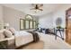 Bright primary bedroom with large windows and vaulted ceiling at 16247 E Belleview Pl, Centennial, CO 80015