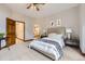 Bedroom with natural light, neutral paint and carpet at 16247 E Belleview Pl, Centennial, CO 80015