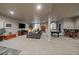 Spacious finished basement with a pool table, seating area, and ample room for entertaining at 2741 Morning Run Ct, Franktown, CO 80116