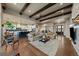 Open-concept living space connects to the kitchen, creating an airy and inviting atmosphere for relaxation and entertainment at 2741 Morning Run Ct, Franktown, CO 80116