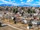 Neighborhood view with mountain backdrop and walking path at 6190 W Canyon Ave, Littleton, CO 80128