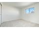 Simple bedroom with neutral walls and carpet at 6190 W Canyon Ave, Littleton, CO 80128