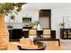 Kitchen with white and dark cabinets and an island at 6190 W Canyon Ave, Littleton, CO 80128