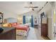 Main bedroom with bright window and vaulted ceiling at 9361 Crestmore Way, Littleton, CO 80126