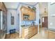 Kitchen with granite countertops, stainless steel appliances, and custom cabinets at 9361 Crestmore Way, Littleton, CO 80126