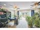 Well-lit office space with sliding glass doors to the outdoor deck at 9361 Crestmore Way, Littleton, CO 80126