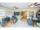 Bright office space with ceiling fans, hardwood floors, and large plants at 9361 Crestmore Way, Littleton, CO 80126