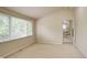 Bright bedroom featuring large windows with natural light and neutral-toned walls at 490 Jackson St, Denver, CO 80206