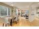 Inviting dining area with hardwood floors, ample natural light, and an open layout to the living spaces at 490 Jackson St, Denver, CO 80206