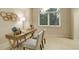 Inviting home office with natural light, a wooden desk, and neutral-toned walls at 490 Jackson St, Denver, CO 80206