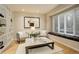 Bright living room with hardwood floors, large windows, and stylish furnishings for a cozy and modern space at 490 Jackson St, Denver, CO 80206