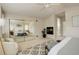 Primary bedroom featuring a fireplace, mirrored closet doors, and a cozy sitting area at 490 Jackson St, Denver, CO 80206