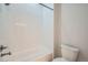 Clean bathroom with white tile and bathtub at 7071 Greenwater Cir, Castle Rock, CO 80108