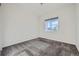 Bright bedroom with neutral walls and carpet at 7071 Greenwater Cir, Castle Rock, CO 80108