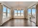 Bright dining room with large windows, hardwood floors and patio access at 7071 Greenwater Cir, Castle Rock, CO 80108