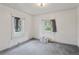This bedroom offers natural light and is ready for renovation at 1551 S University Blvd, Denver, CO 80210
