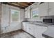 This is a kitchen ready to be remodeled with natural light at 1551 S University Blvd, Denver, CO 80210