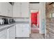 View of kitchen cabinets, dishwasher, and microwave oven at 1551 S University Blvd, Denver, CO 80210