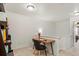 Upstairs landing area featuring desk, chair, and natural light at 643 S Norfolk Way, Aurora, CO 80017