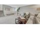 Neutral living area featuring a sofa, modern coffee table, and stylish decor at 36700 Mossberg Ct, Elizabeth, CO 80107