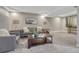 Finished basement with comfortable seating, stylish decor, and modern lighting at 36700 Mossberg Ct, Elizabeth, CO 80107
