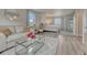 Comfortable main bedroom boasts soft natural light, a cozy seating area, and views of the outdoors at 36700 Mossberg Ct, Elizabeth, CO 80107