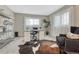 Comfortable office space with a desk, chair, shelving, and natural light at 36700 Mossberg Ct, Elizabeth, CO 80107