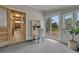 Sitting room with desk and glass doors showcasing the beautiful backyard at 36700 Mossberg Ct, Elizabeth, CO 80107