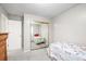 Well-organized bedroom featuring mirrored closet doors and twin bed, perfect for a guest room or a space at 6568 S Dahlia Cir, Centennial, CO 80121