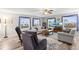 Bright and airy living room with lots of natural light, neutral furniture, and hardwood floors at 6568 S Dahlia Cir, Centennial, CO 80121