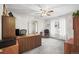 Office space with large desk, sliding closet doors, and a comfortable chair at 6568 S Dahlia Cir, Centennial, CO 80121