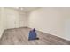 Spacious finished basement features luxury vinyl plank flooring, neutral paint and recessed lighting at 4221 S Blackhawk Cir # 7G, Aurora, CO 80014
