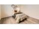 Bright bedroom with modern decor and wood-look flooring at 4221 S Blackhawk Cir # 7G, Aurora, CO 80014