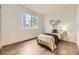 Bright bedroom with modern decor and a large window at 4221 S Blackhawk Cir # 7G, Aurora, CO 80014