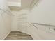 Spacious walk-in closet features wire shelving for ample storage at 4221 S Blackhawk Cir # 7G, Aurora, CO 80014
