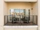 Balcony with metal railing and glass door provides scenic views of the city at 475 W 12Th Ave # 9A, Denver, CO 80204