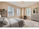 Bedroom featuring neutral decor, lots of natural light, and a seating area at 475 W 12Th Ave # 9A, Denver, CO 80204