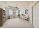 Inviting home office with built-in shelving, bright windows, and modern decor at 475 W 12Th Ave # 9A, Denver, CO 80204