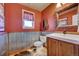 Rustic-style half bathroom with corrugated metal at 1641 Castlewood Dr, Franktown, CO 80116