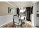 Elegant dining room with neutral decor and natural light at 1641 Castlewood Dr, Franktown, CO 80116