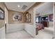 Hallway with decorative wall trim and access to bedrooms at 1641 Castlewood Dr, Franktown, CO 80116