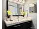 Clean bathroom with a modern vanity and mirror at 9680 Brentwood Way # 203, Broomfield, CO 80021