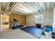 Spacious unfinished basement with workout area and ample room for storage at 17341 Red Cosmos Pt, Parker, CO 80134