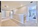 Bright hallway with carpeted floors leading to the bedrooms at 17341 Red Cosmos Pt, Parker, CO 80134